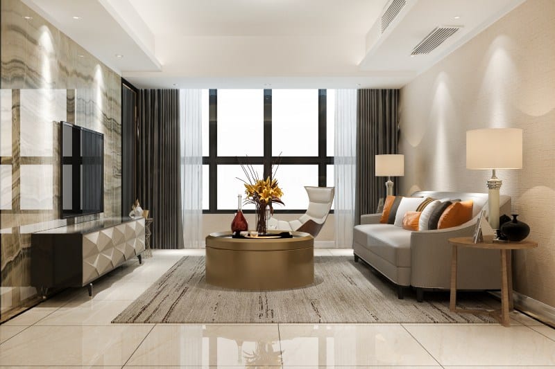 Luxury living room with stone wall panels, natural textures, and Sustainable Materials for a high-end home makeover.