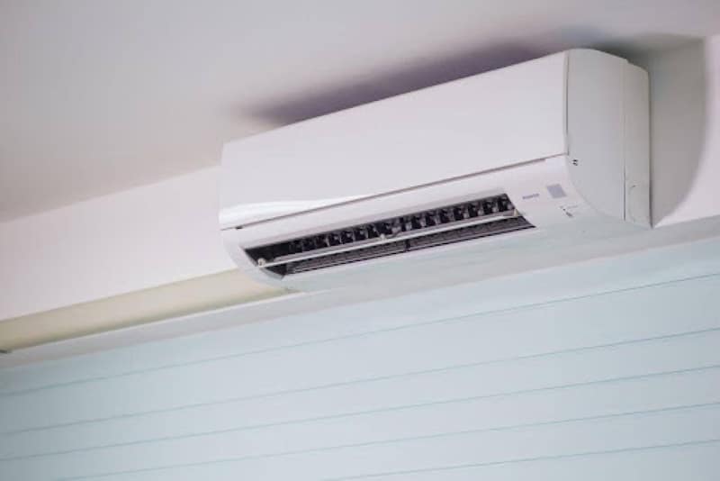 Understanding Home Services Warranties and Guarantees Wall-mounted ductless mini split system used for residential home services.
