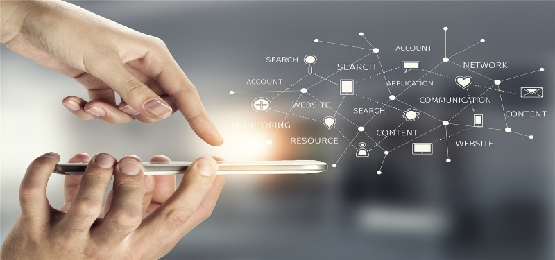Person using a smartphone with digital network icons showing online services and communication.