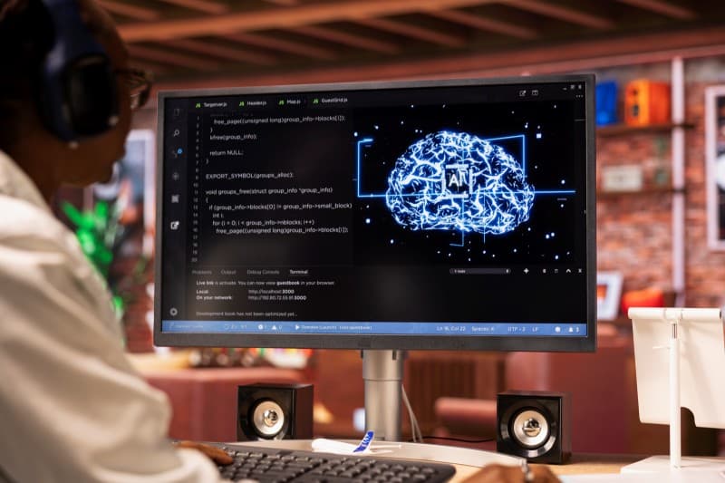Claude for Indie Game Development: What Can You Actually Use It For? Developer using Claude for indie game development with AI-assisted coding displayed on a computer screen.